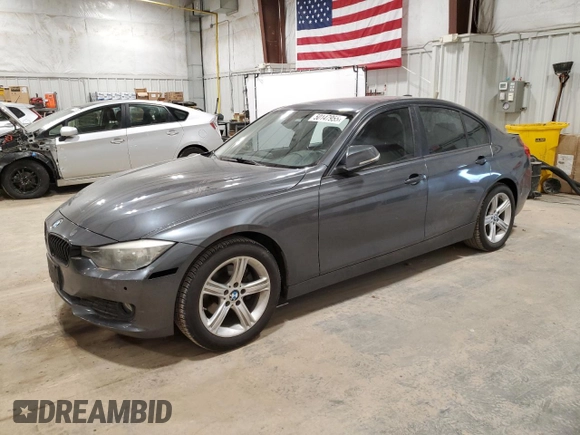 2015 BMW 3 Series 320i with VIN WBA3B1C5XFK139521, listed as a Copart auction lot 50147955 with 82,701 mi miles and Clean Title. Bid and sale history available at carsss.com. Image 1.