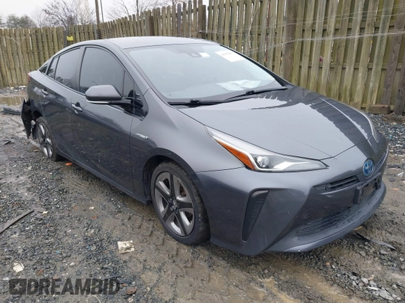 2019 Toyota Prius L Eco z VIN JTDKARFU8K3085918, wystawiony jako IAAI lot #41107891 z przebiegiem 166 295 mil mil oraz . Historia ofert i sprzedaży dostępna na DreamBid. Obrazek 1.