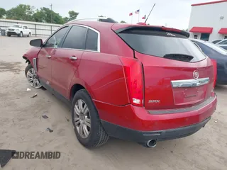 2015 Cadillac SRX Luxury Collection z VIN 3GYFNBE36FS615853, wystawiony jako IAAI lot #41937076 z przebiegiem 109 123 mil mil oraz . Historia ofert i sprzedaży dostępna na DreamBid. Obrazek 3.
