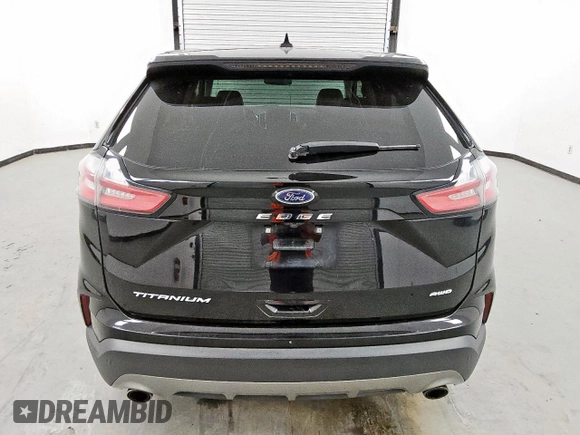 2021 Ford Edge Titanium с VIN 2FMPK4K94MBA27083, выставлен на аукционе Copart как лот 62149285 с пробегом 128 325 миль миль и Чистый • Clean title. История ставок и продаж доступна на DreamBid. Изображение 6.
