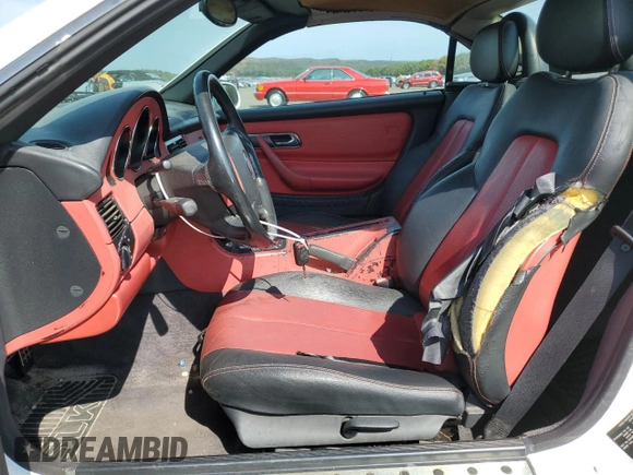 1999 Mercedes-Benz SLK-Class with VIN WDBKK47F9XF130501, listed as a Copart auction lot 71770824 with 124,669 mi miles and Clean Title. Bid and sale history available at carsss.com. Image 7.
