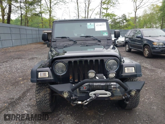 2006 Jeep Wrangler Rubicon z VIN 1J4FA69S76P749712, wystawiony jako IAAI lot #42240375 z przebiegiem 75 405 mil mil oraz . Historia ofert i sprzedaży dostępna na DreamBid. Obrazek 12.