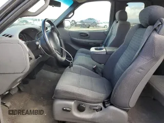 2001 Ford F-150 XL with VIN 1FTRX17W91NB71630, listed as a Copart auction lot 56583545 with 209,009 mi miles and Salvage title. Bid and sale history available at DreamBid. Image 7.