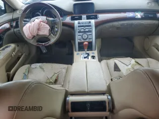 2005 Acura RL z VIN JH4KB16565C019863, wystawiony jako Copart lot #55317535 z przebiegiem 213 732 mil mil oraz Szkody całkowita. Historia ofert i sprzedaży dostępna na DreamBid. Obrazek 8.