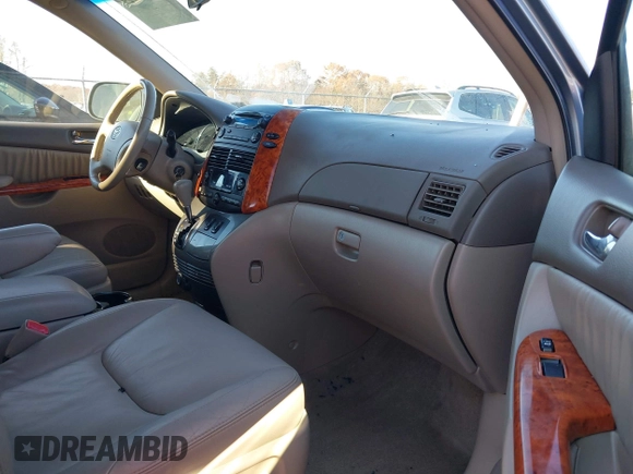 2010 Toyota Sienna XLE with VIN 5TDYK4CC6AS320562, listed as a IAAI auction lot 41005929 with 105,082 mi miles and . Bid and sale history available at DreamBid. Image 5.