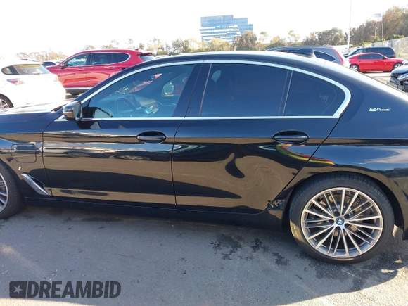 2019 BMW 5 Series 530e iPerformance with VIN WBAJA9C53KB388861, listed as a IAAI auction lot 41621712 with 68,128 mi miles. Bid and sale history available at carsss.com. Image 14.