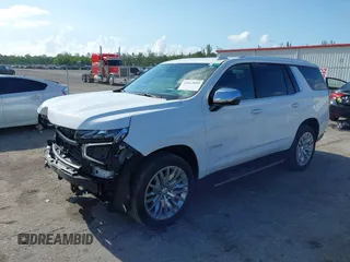 2023 Chevrolet Tahoe Premier with VIN 1GNSKSKD0PR453465, listed as a IAAI auction lot 42512099 with 23,252 mi miles and . Bid and sale history available at DreamBid. Image 2.