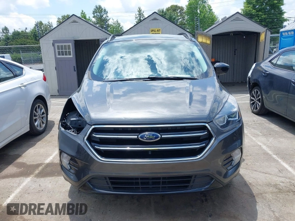 2019 Ford Escape SE z VIN 1FMCU0GD0KUB74569, wystawiony jako IAAI lot #42271476 z przebiegiem 66 335 mil mil oraz . Historia ofert i sprzedaży dostępna na DreamBid. Obrazek 13.
