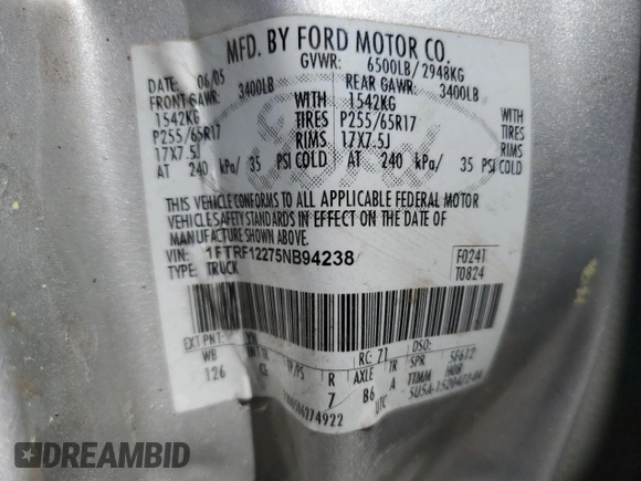 2005 Ford F-150 XL with VIN 1FTRF12275NB94238, listed as a Copart auction lot 49893695 with 283,085 mi miles and Salvage title. Bid and sale history available at DreamBid. Image 14.