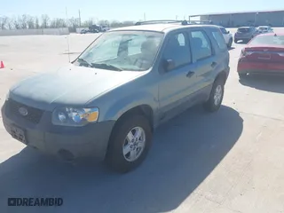 2007 Ford Escape XLS with VIN 1FMYU92Z77KB08603, listed as a IAAI auction lot 41858410 with 144,830 mi miles. Bid and sale history available at carsss.com. Image 2.