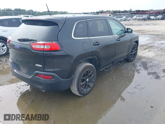 2014 Jeep Cherokee Latitude with VIN 1C4PJLCS4EW106479, listed as a IAAI auction lot 42283214 with 179,029 mi miles and . Bid and sale history available at DreamBid. Image 4.