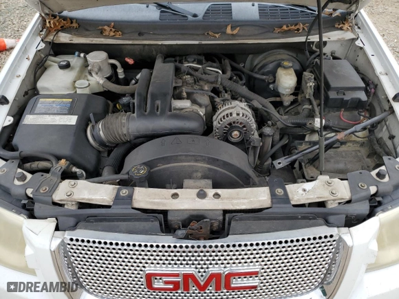 2005 GMC Envoy Denali with VIN 1GKET63M452384525, listed as a Copart auction lot 82117214 with 182,469 mi miles and Salvage Title. Bid and sale history available at carsss.com. Image 14.