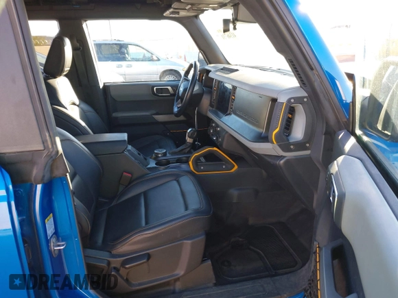 2022 Ford Bronco z VIN 1FMEE5DPXNLB37346, wystawiony jako IAAI lot #41346731 z przebiegiem 20 709 mil mil oraz . Historia ofert i sprzedaży dostępna na DreamBid. Obrazek 5.