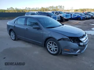 2012 Ford Fusion SEL with VIN 3FAHP0JA3CR340968, listed as a Copart auction lot 48044005 with 144,872 mi miles and Salvage Title. Bid and sale history available at carsss.com. Image 4.