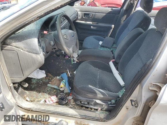 2002 Ford Taurus SES Standard with VIN 1FAFP55U02A115781, listed as a Copart auction lot 59007595 with 97,189 mi miles and Salvage title. Bid and sale history available at DreamBid. Image 7.