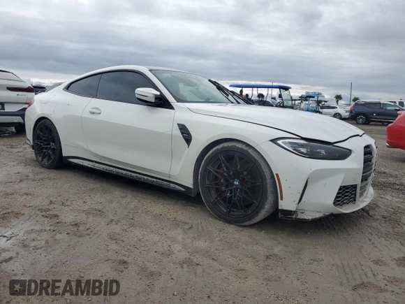 2021 BMW M4 with VIN WBS53AZ04MCG28925, listed as a Copart auction lot 73985524 with 0 mi miles and Salvage Title. Bid and sale history available at carsss.com. Image 4.