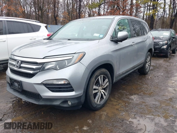 2017 Honda Pilot EX-L with VIN 5FNYF6H51HB069068, listed as a IAAI auction lot 41567728 with 100,618 mi miles and . Bid and sale history available at DreamBid. Image 17.