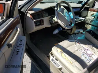 1995 Cadillac DeVille z VIN 1G6KD52B6SU274827, wystawiony jako Copart lot #41902125 z przebiegiem Nie podano mil oraz Szkoda całkowita • Salvage title. Historia ofert i sprzedaży dostępna na DreamBid. Obrazek 8.
