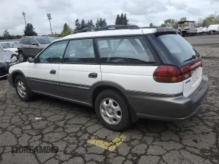 1996 Subaru Legacy Outback with VIN 4S3BG6850T7971454, listed as a Copart auction lot 52082395 with 173,542 mi miles and Salvage title. Bid and sale history available at DreamBid. Image 2.