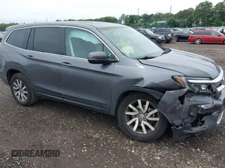 2019 Honda Pilot EX-L with VIN 5FNYF6H5XKB096065, listed as a IAAI auction lot 42631239 with 171,768 mi miles and . Bid and sale history available at DreamBid. Image 6.