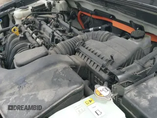 2012 Hyundai Sonata Hybrid z VIN KMHEC4A41CA054827, wystawiony jako IAAI lot #42993642 z przebiegiem 120 320 mil mil oraz . Historia ofert i sprzedaży dostępna na DreamBid. Obrazek 19.