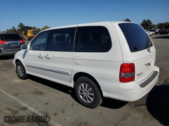 2005 Kia Sedona LX with VIN KNDUP132656669670, listed as a Copart auction lot 55102055 with 107,584 mi miles and Clean Title. Bid and sale history available at DreamBid. Image 2.