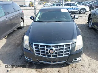 2012 Cadillac CTS with VIN 1G6DM5E39C0106931, listed as a IAAI auction lot 41909732 with 213,319 mi miles and . Bid and sale history available at DreamBid. Image 12.