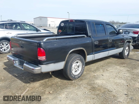 2000 Dodge Dakota Sport with VIN 1B7GL2AX8YS790208, listed as a IAAI auction lot 41613640 with 365,198 mi miles and . Bid and sale history available at DreamBid. Image 4.