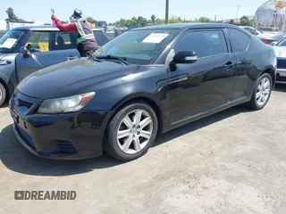 2012 Scion tC with VIN JTKJF5C79C3025581, listed as a IAAI auction lot 42170728 with 92,842 mi miles. Bid and sale history available at carsss.com. Image 2.