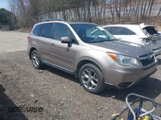 2016 Subaru Forester Touring z VIN JF2SJAVC1GH404811, wystawiony jako IAAI lot #42093338 z przebiegiem 44 635 mil mil oraz . Historia ofert i sprzedaży dostępna na DreamBid. Obrazek 1.