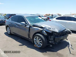 2014 Infiniti Q50 Premium z VIN JN1BV7AP0EM673338, wystawiony jako IAAI lot #42609017 z przebiegiem 102 177 mil mil oraz . Historia ofert i sprzedaży dostępna na DreamBid. Obrazek 1.