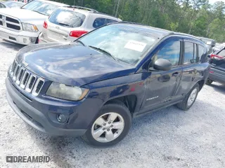 2014 Jeep Compass Sport with VIN 1C4NJCBA4ED594103, listed as a IAAI auction lot 42035379 with 127,161 mi miles. Bid and sale history available at carsss.com. Image 2.