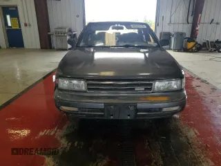 1990 Nissan Maxima с VIN JN1HJ01P3LT420451, выставлен на аукционе Copart как лот 60822275 с пробегом 146 196 миль миль и Списание • Salvage title. История ставок и продаж доступна на DreamBid. Изображение 5.