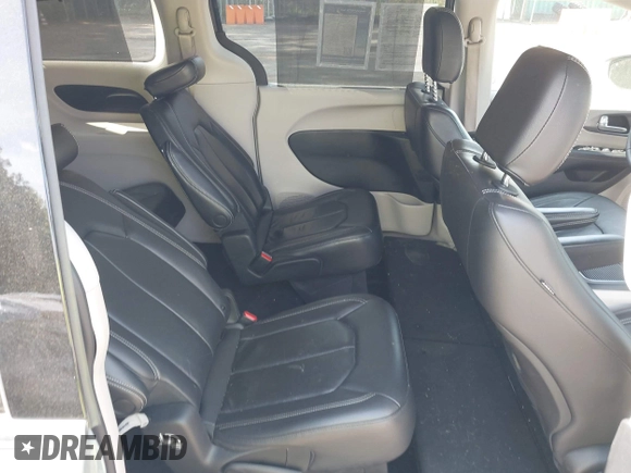 2022 Chrysler Pacifica Touring L with VIN 2C4RC1BG3NR168565, listed as a IAAI auction lot 42150290 with 61,750 mi miles and . Bid and sale history available at DreamBid. Image 8.