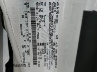 2012 Ford Focus SE z VIN 1FAHP3K27CL256370, wystawiony jako Copart lot #42689255 z przebiegiem 92 641 mil mil oraz Szkoda całkowita • Salvage title. Historia ofert i sprzedaży dostępna na DreamBid. Obrazek 13.