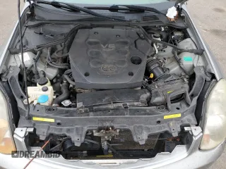 2004 Infiniti G35 w/Leather z VIN JNKCV51F04M715114, wystawiony jako Copart lot #45109415 z przebiegiem 244 446 mil mil oraz Szkoda całkowita • Salvage title. Historia ofert i sprzedaży dostępna na DreamBid. Obrazek 11.