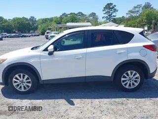 2013 Mazda CX-5 Touring with VIN JM3KE4CE8D0156843, listed as a IAAI auction lot 42018321 with 143,396 mi miles. Bid and sale history available at carsss.com. Image 14.