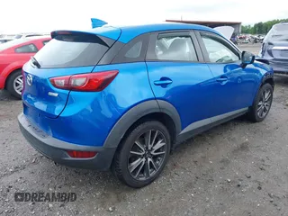 2017 Mazda CX-3 Touring z VIN JM1DKFC7XH0171860, wystawiony jako IAAI lot #42249818 z przebiegiem 54 873 mil mil oraz . Historia ofert i sprzedaży dostępna na DreamBid. Obrazek 4.