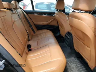 2019 BMW 5 Series 530i xDrive z VIN WBAJA7C51KG911480, wystawiony jako Copart lot #58219105 z przebiegiem 67 557 mil mil oraz Szkoda całkowita • Salvage title. Historia ofert i sprzedaży dostępna na DreamBid. Obrazek 10.