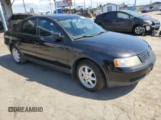 2000 Volkswagen Passat GLS z VIN WVWMD23B0YP307525, wystawiony jako Copart lot #57040775 z przebiegiem 167 440 mil mil oraz Szkoda całkowita • Salvage title. Historia ofert i sprzedaży dostępna na DreamBid. Obrazek 4.