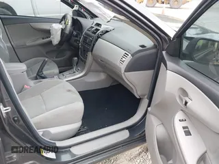2012 Toyota Corolla L with VIN 2T1BU4EE3CC901530, listed as a IAAI auction lot 42099048 with 210,117 mi miles. Bid and sale history available at carsss.com. Image 5.