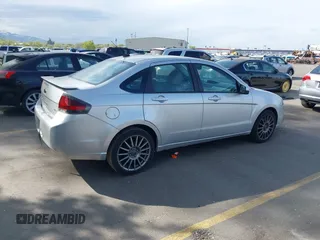 2011 Ford Focus SES with VIN 1FAHP3GN2BW180198, listed as a IAAI auction lot 42121335 with 162,826 mi miles. Bid and sale history available at carsss.com. Image 4.
