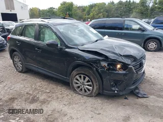 2016 Mazda CX-5 Sport with VIN JM3KE2BE8G0804398, listed as a IAAI auction lot 40490953 with 116,279 mi miles and . Bid and sale history available at carsss.com. Image 1.