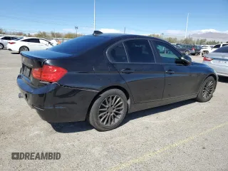 2014 BMW 3 Series 328i with VIN WBA3C1C59EK107963, listed as a Copart auction lot 49668095 with 135,768 mi miles and Salvage title. Bid and sale history available at DreamBid. Image 3.