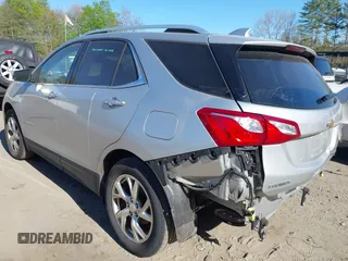 2018 Chevrolet Equinox Premier with VIN 3GNAXVEV4JS598239, listed as a IAAI auction lot 42112886 with 142,093 mi miles and . Bid and sale history available at DreamBid. Image 3.
