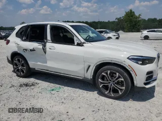 2023 BMW X5 sDrive40i with VIN 5UXCR4C04P9R12480, listed as a Copart auction lot 61082815 with 17,249 mi miles and Salvage title. Bid and sale history available at DreamBid. Image 4.