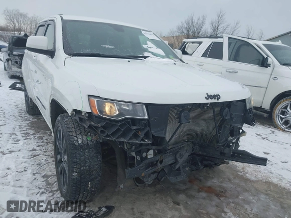 2018 Jeep Grand Cherokee Laredo E with VIN 1C4RJFAG1JC499457, listed as a IAAI auction lot 41379459 with 127,344 mi miles and . Bid and sale history available at DreamBid. Image 6.