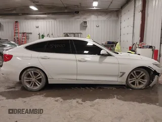 2016 BMW 3 Series GT 328i xDrive with VIN WBA8Z5C54GG500965, listed as a IAAI auction lot 41254000 with 115,672 mi miles. Bid and sale history available at carsss.com. Image 13.