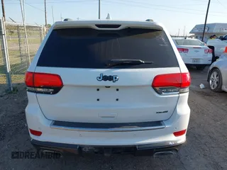 2015 Jeep Grand Cherokee Summit with VIN 1C4RJFJT5FC767687, listed as a IAAI auction lot 42015878 with 1 mi miles. Bid and sale history available at carsss.com. Image 16.