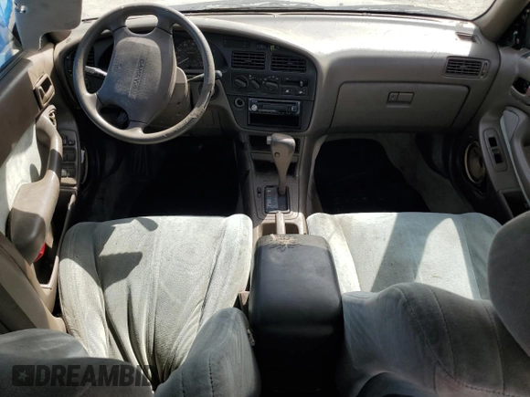 1993 Toyota Camry LE with VIN JT2SK12E4P0112014, listed as a Copart auction lot 52822095 with 249,458 mi miles and Salvage Title. Bid and sale history available at carsss.com. Image 8.